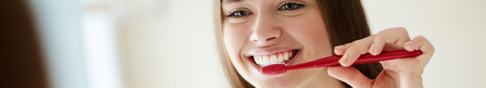 Woman brushing her teeth