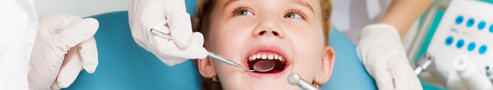 Little girl visiting dentist