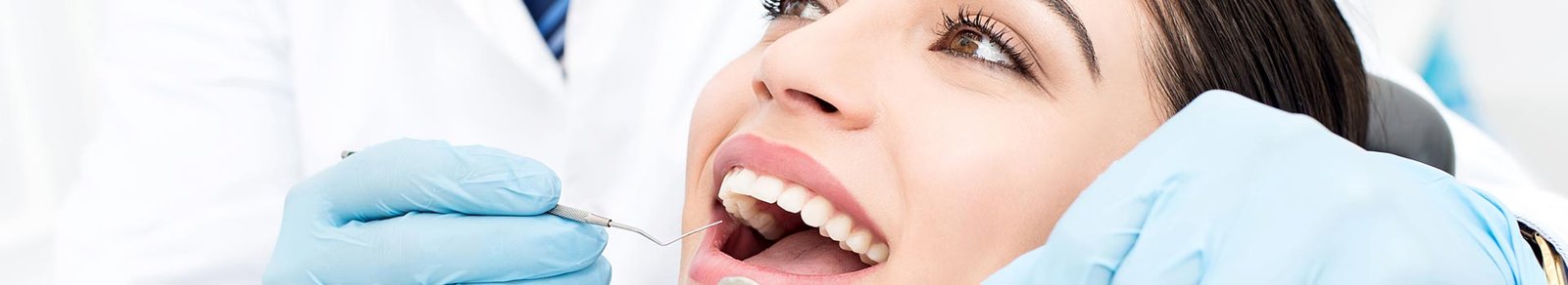 Female patient receiving dental care